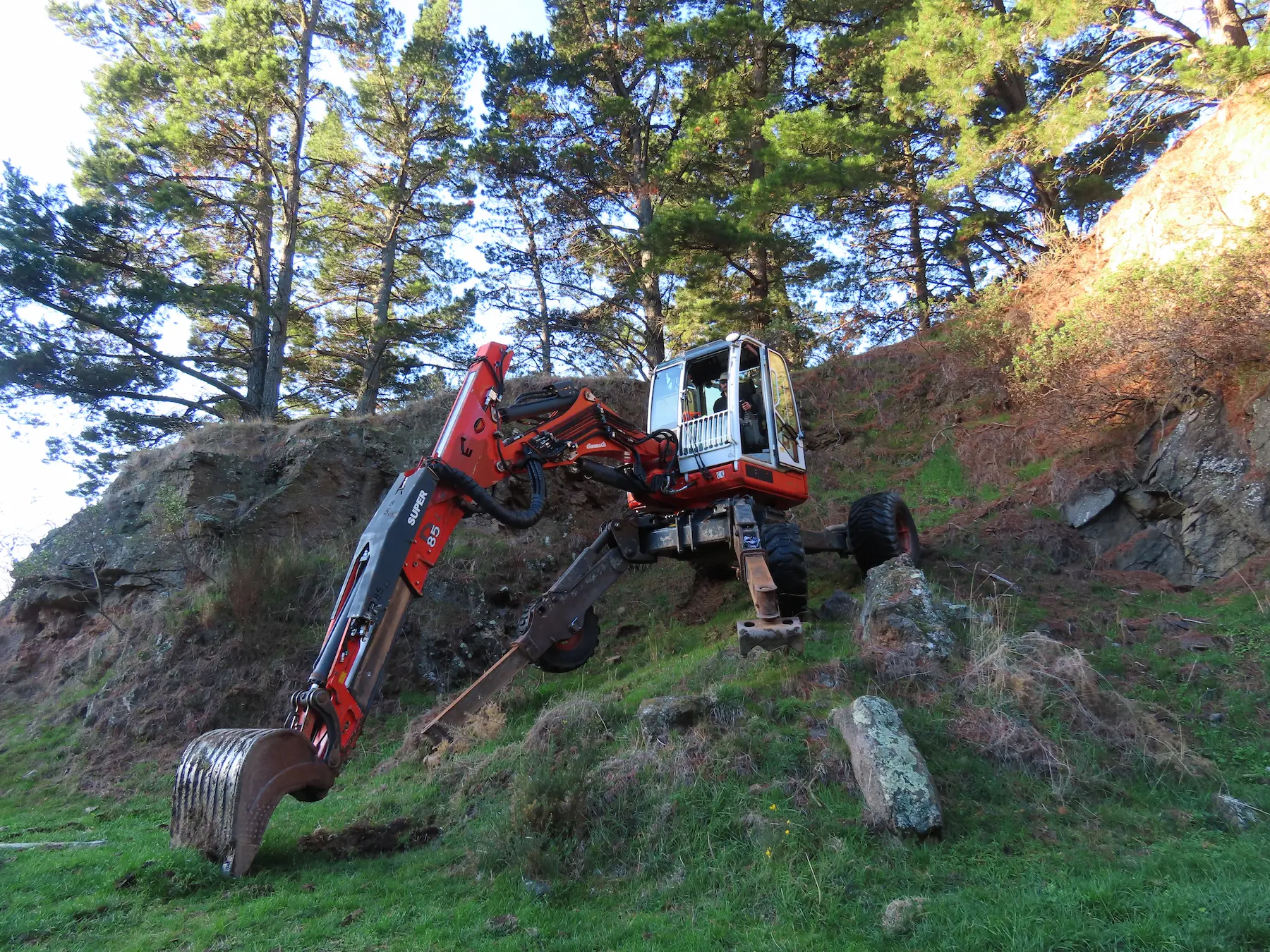 Trenching work on steep terrain